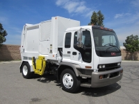 2007 GMC T7500 with Heil Retriever Satellite 10 Yard Side Load Refuse Truck